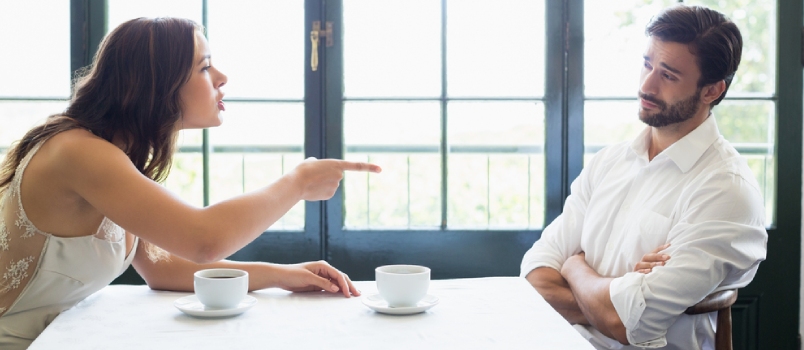 Couple Arguing With Each Other In The Restaurant