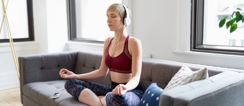 Beautiful Women Meditation At Home With The Headphone