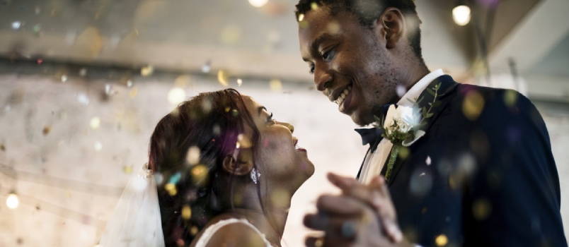 Newlywed African Descent Couple Dancing Wedding Celebration