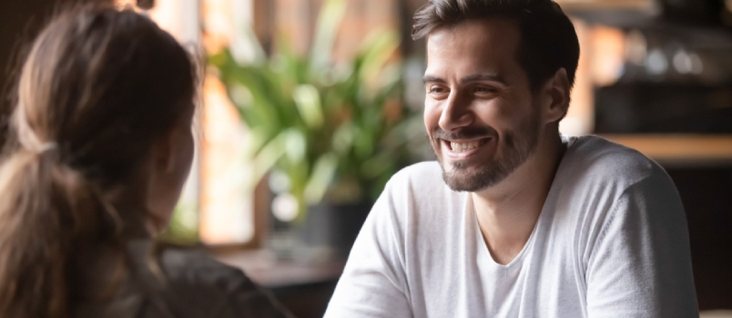 Rear View Woman Sitting At Table In Cafe With Handsome Smiling Man, People Spends Time At Meeting Searching For Soul Mate
