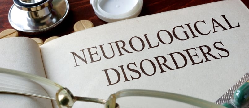 Neurological Disorder Text With Glasses And Doctor Stethoscope On Table