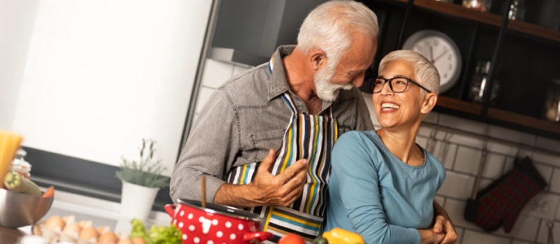 Lovely Elderly Couple Have Fun In The Kitchen