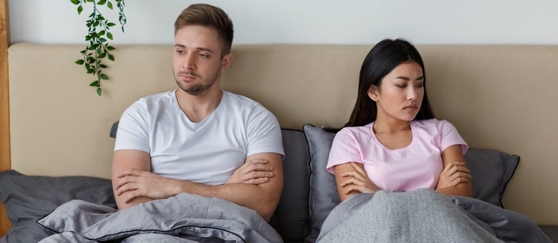 Unhappy Couple After Quarrel Lying In Bed Offended And Uninterested In Sexual Life At Home