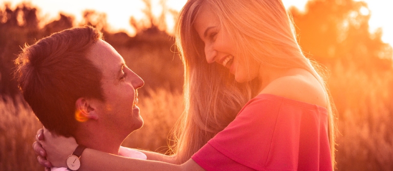 Young Beautiful Couple In Love Looking Each Other Smiling Together