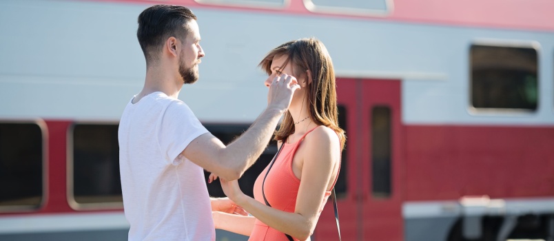 Couple saying goodbye