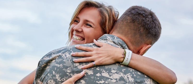 Army Wife Hugging And Smiling Family Home Back Happiness Concept