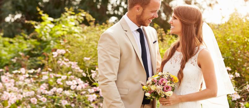 Bride And Groom With Lovely Flowers Bookey Holding In Hands After Wedding Ceremony