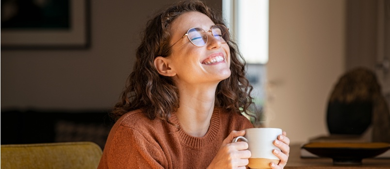 Young woman having coffee