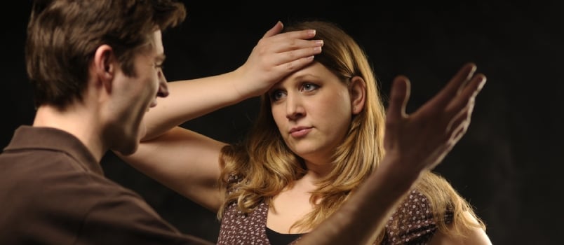 Fighting Couple On Black Background