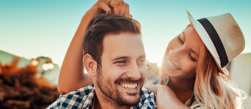 Smiling couple in love outdoors