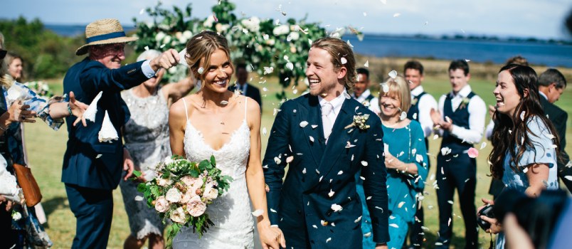 Newly married couple taking walk