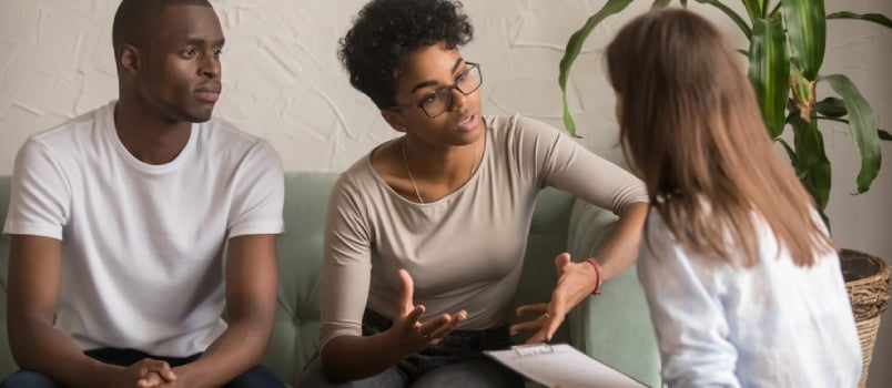 Unhappy Jealous Mixed-race Wife Talk To Psychologist Counselor Complain On Bad Relationship With Husband