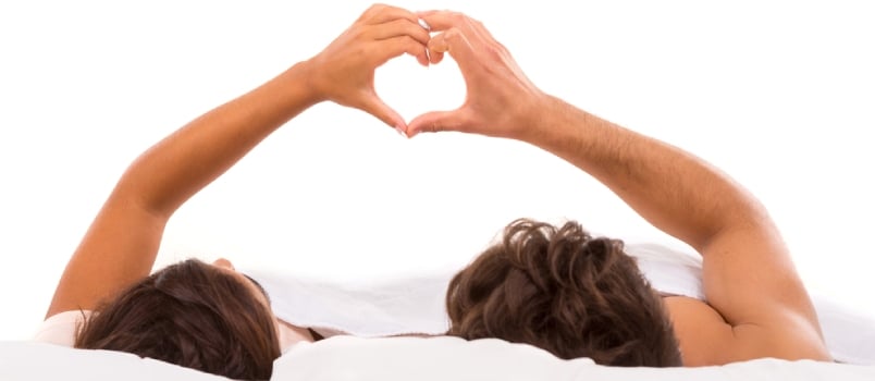 A Beautiful Young Passionate Couple In Bed