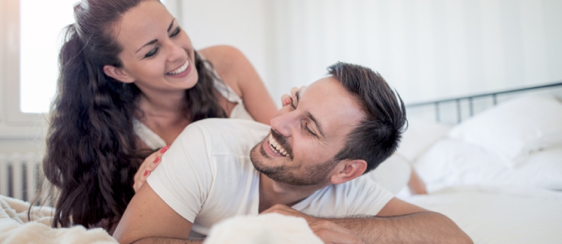 Young Loving Couple In The Bed.modern Lifestyle Concept