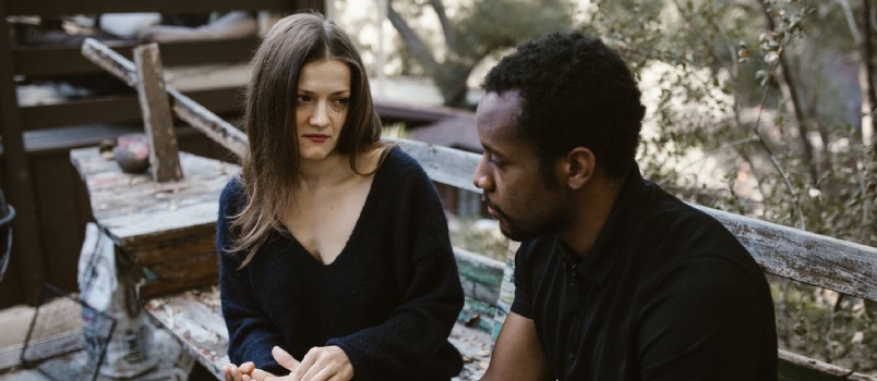 Couple comunicating outdoor