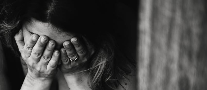 Upset Lady Crying While Covering Her Face With Her Hands