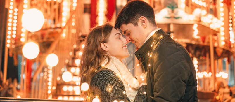 Young Couple Kissing Hugging Outdoor Night Street Christmas Time