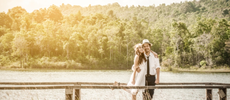 Asian Couple With Pre Wedding Sceen Out Door Tree Background