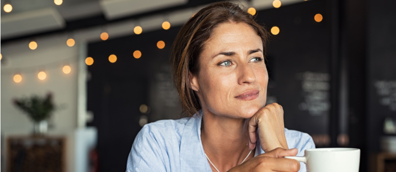 Woman having coffee