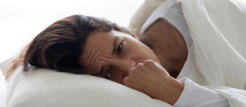 Close Up Depressed Woman Lying On Pillow In Bed Feels Unhappy About Ruined Relations Divorce, Break Up With Loved One