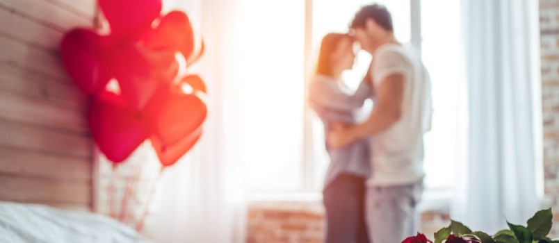 Loving Couple Hugging Together Corner In The Room With Hot Air Balloon