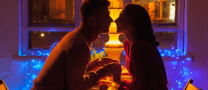 Young Attractive Couple Dating Together On Resturant