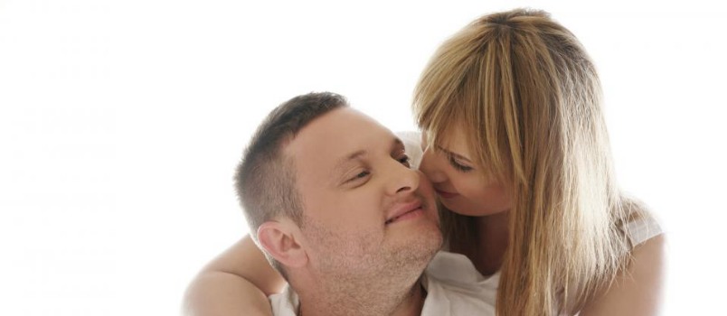 Young Passionate Couple Doing Romance Together Shot In Studio With White Background