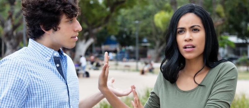 Beautiful Latin Woman Rejecting Man Outdoors In The City