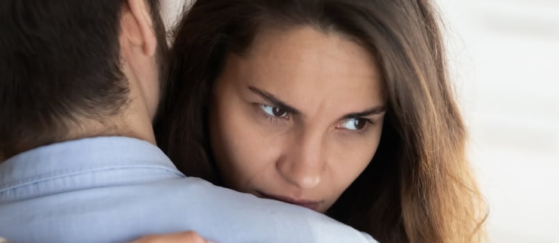 Women Hugging Men With Suspicious Thought