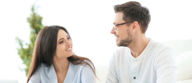 Young Couple Thinking Over Pension Plan At Home