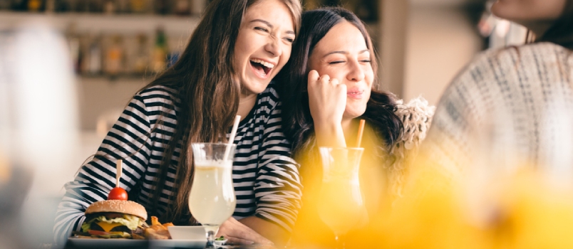 Old Friends Meeting Up After Long Time for Drinks and Eating, Talking About Their Memories