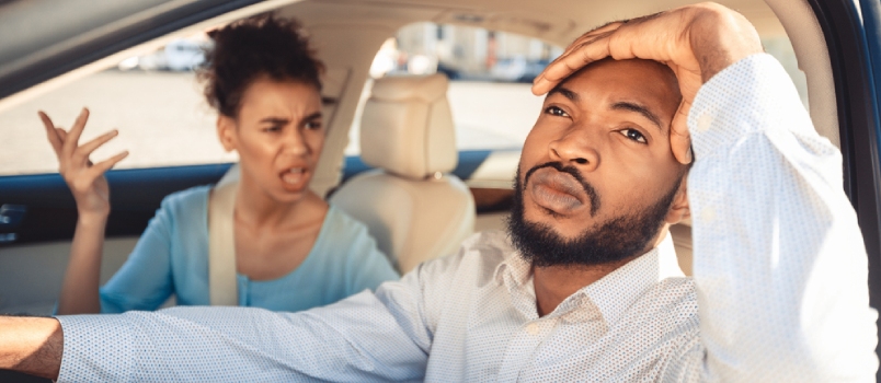 Afro Couple Arguing During Their Journey In Car, Frustrated Man Looking Aside