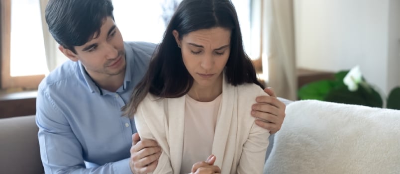 Caring Young Husband Touch Hug Comfort Upset Beloved Woman Feeling Depressed or Anxious About Relationships Problems