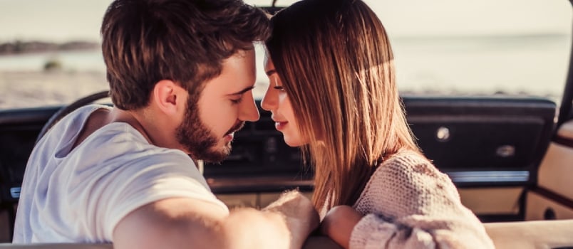 Couple on Road Trip Doing Romance Together