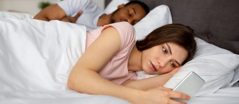 Millennial Lady Feeling Scared and Jealous of Her Boyfriend's Infidelity, Looking Through His Phone Messages