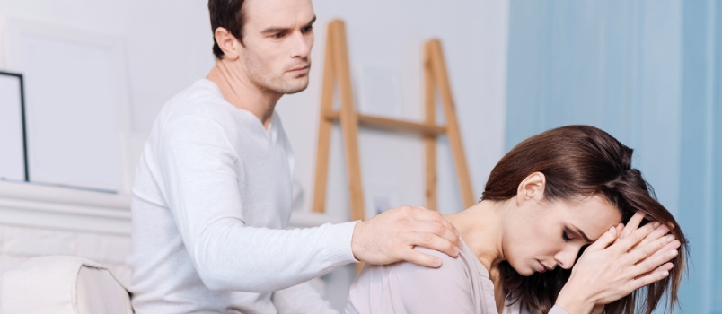 Gloomy Troubled Woamn Sittign in the Arm Chair