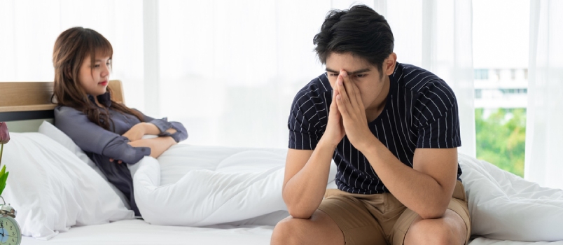 Sad Upset Couple Together in Bedroom