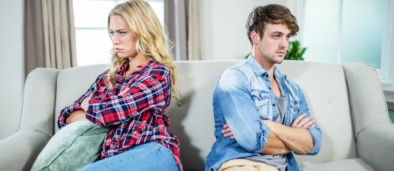 Couple Having an Argument on the Sofa