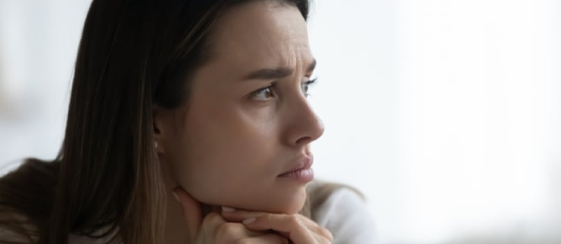 Stressed Upset Lady Sitting Alone at Home