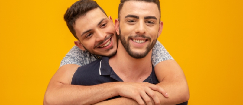 A Gay Couple on Yellow Background Studio.