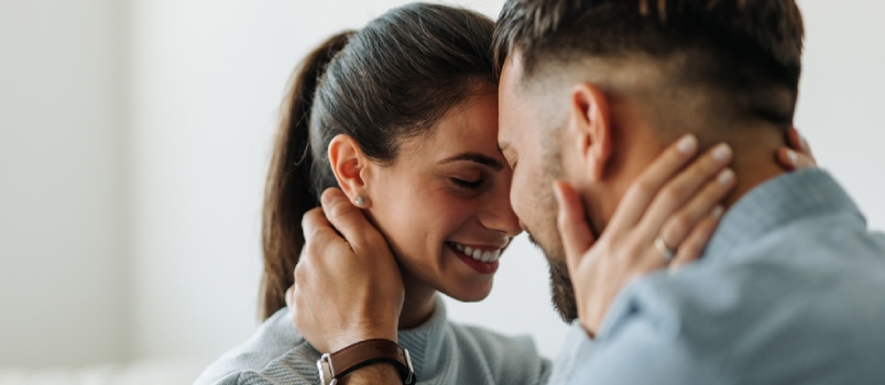 Two Lovers, Standing Close to Each Other, Hands on Neck.