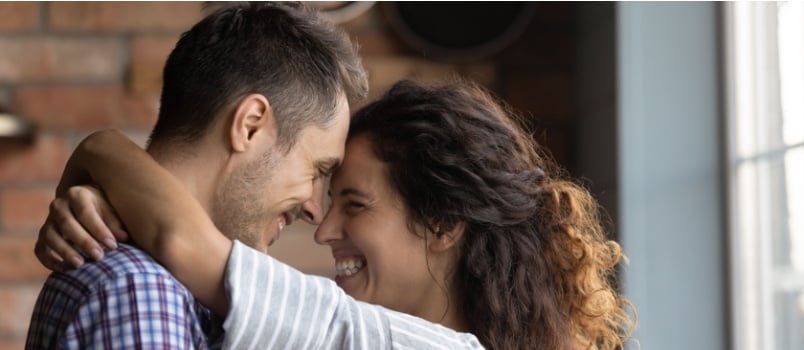 Young couple looking into each other eyes