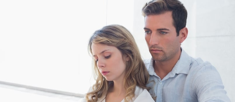 Unhappy Couple Not Talking After an Argument in Living Room at Home