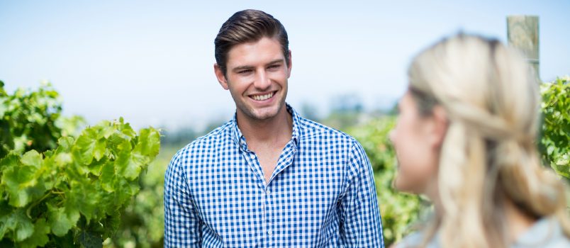 Men and Women in Love Man Saying Goodbye While Women Is Still Looking to Him and Smiling