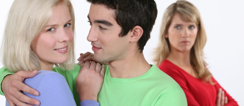 Love Triangle Couples Studio Shot With White Isolated Background