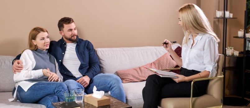 Young couple taking therapy session