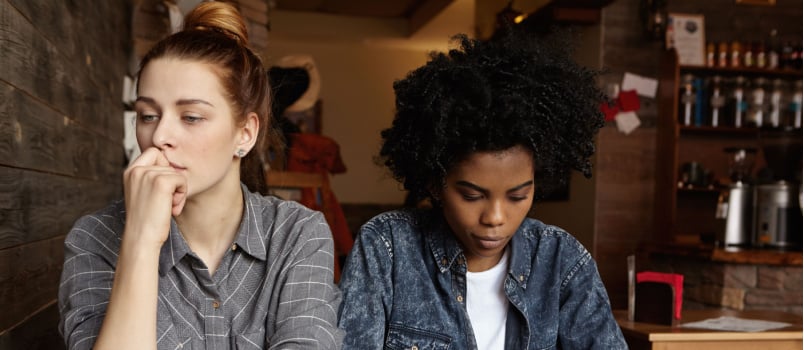 Two lesbian couple not talking to each other