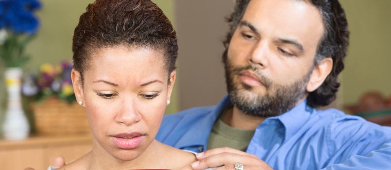 Sad Wife Focus While Man Is Trying to Hide His Infidelity Behaviour
