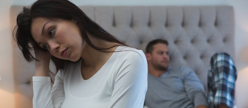 Unsatisfied Women Sitting Front at Bedroom