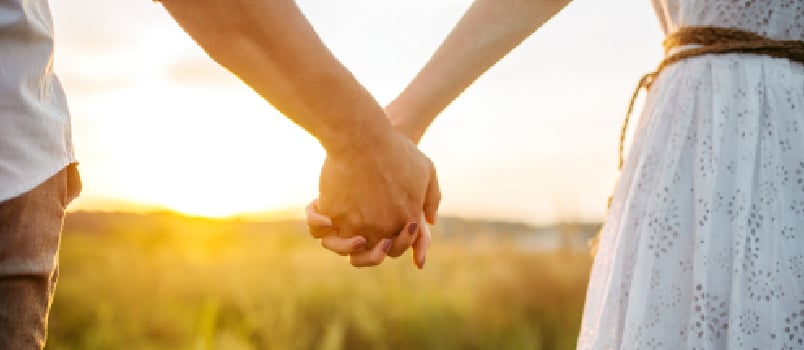 Men and Women Holding Hands Together Stand Together in the Feild With Lovely Sunset Evening